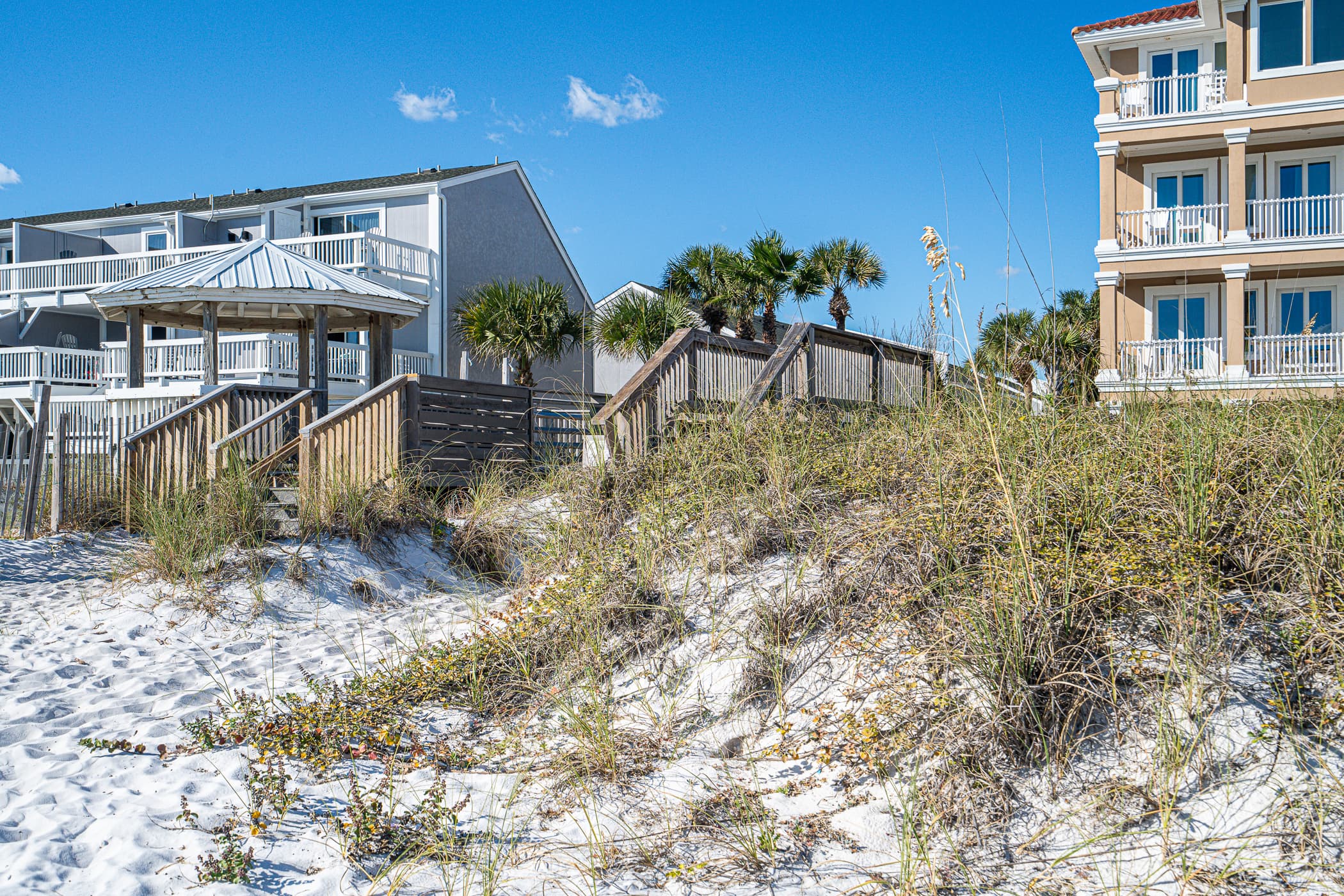 Beach Access Awaits: Steps from pristine shores and charming gazebo, your ocean retreat begins!