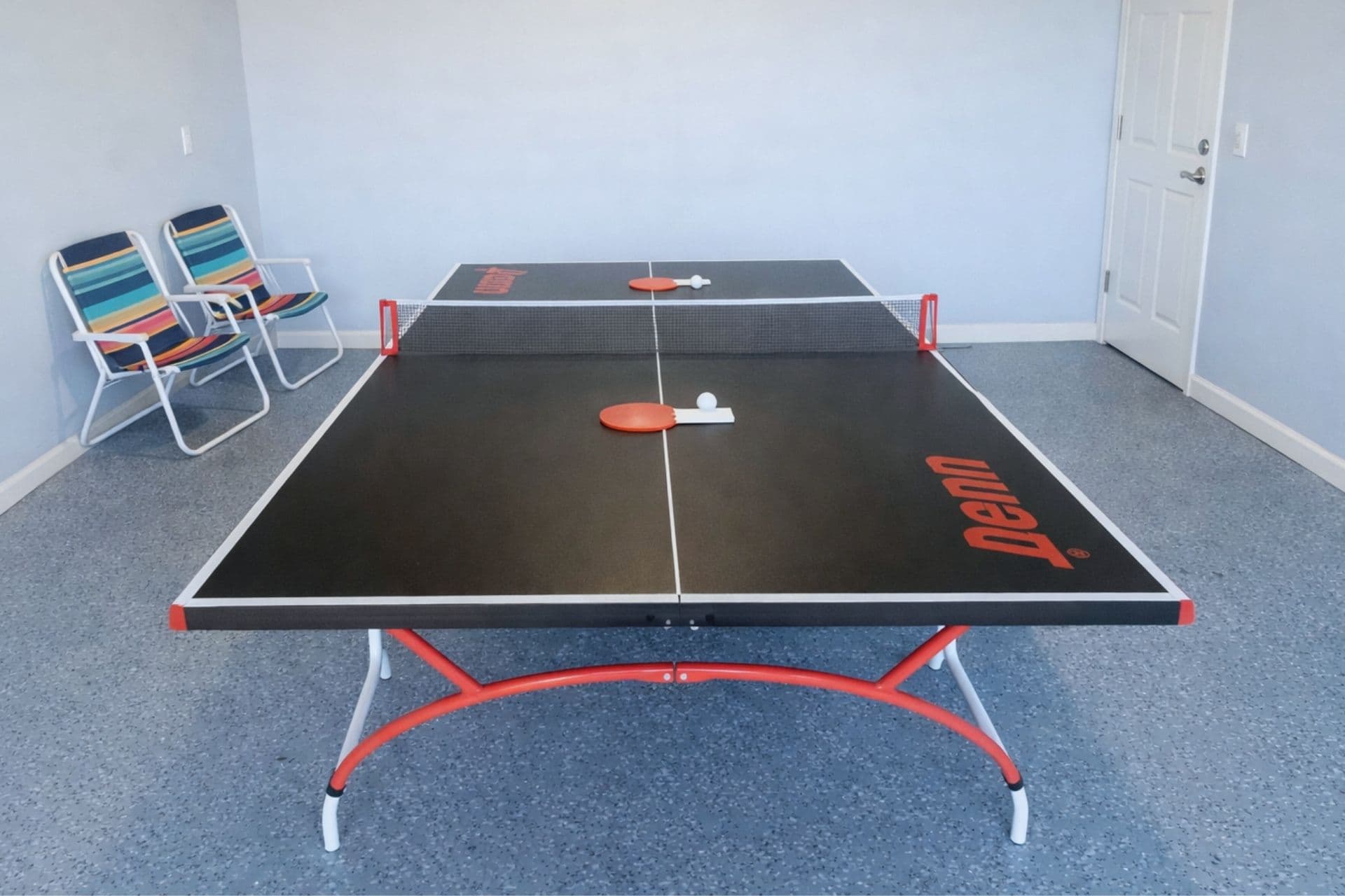 Game Room: Unleash your competitive spirit with our vibrant ping pong table ready for action!