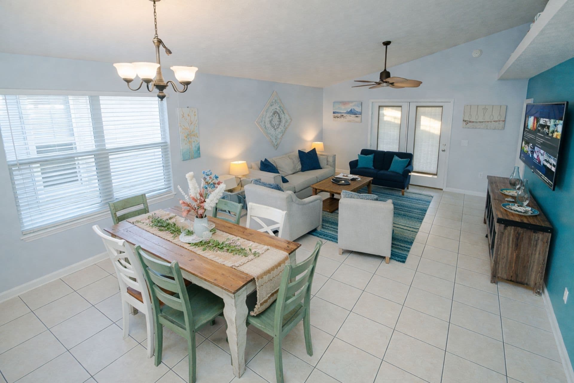 Dining Room: Gather around the rustic table for lively meals and ocean-inspired decor!