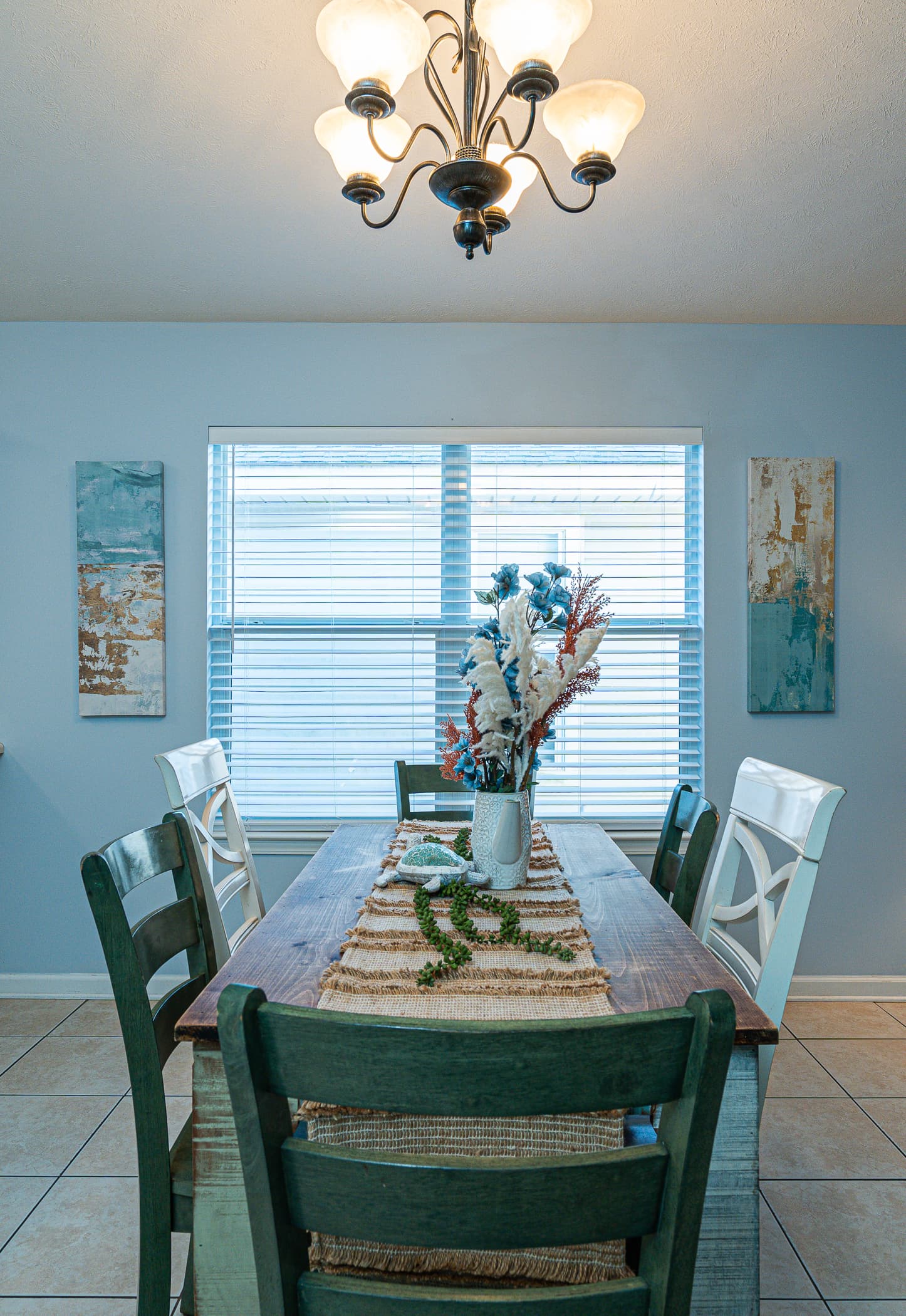 Dining Room: Gather around the rustic table for lively meals and ocean-inspired decor!
