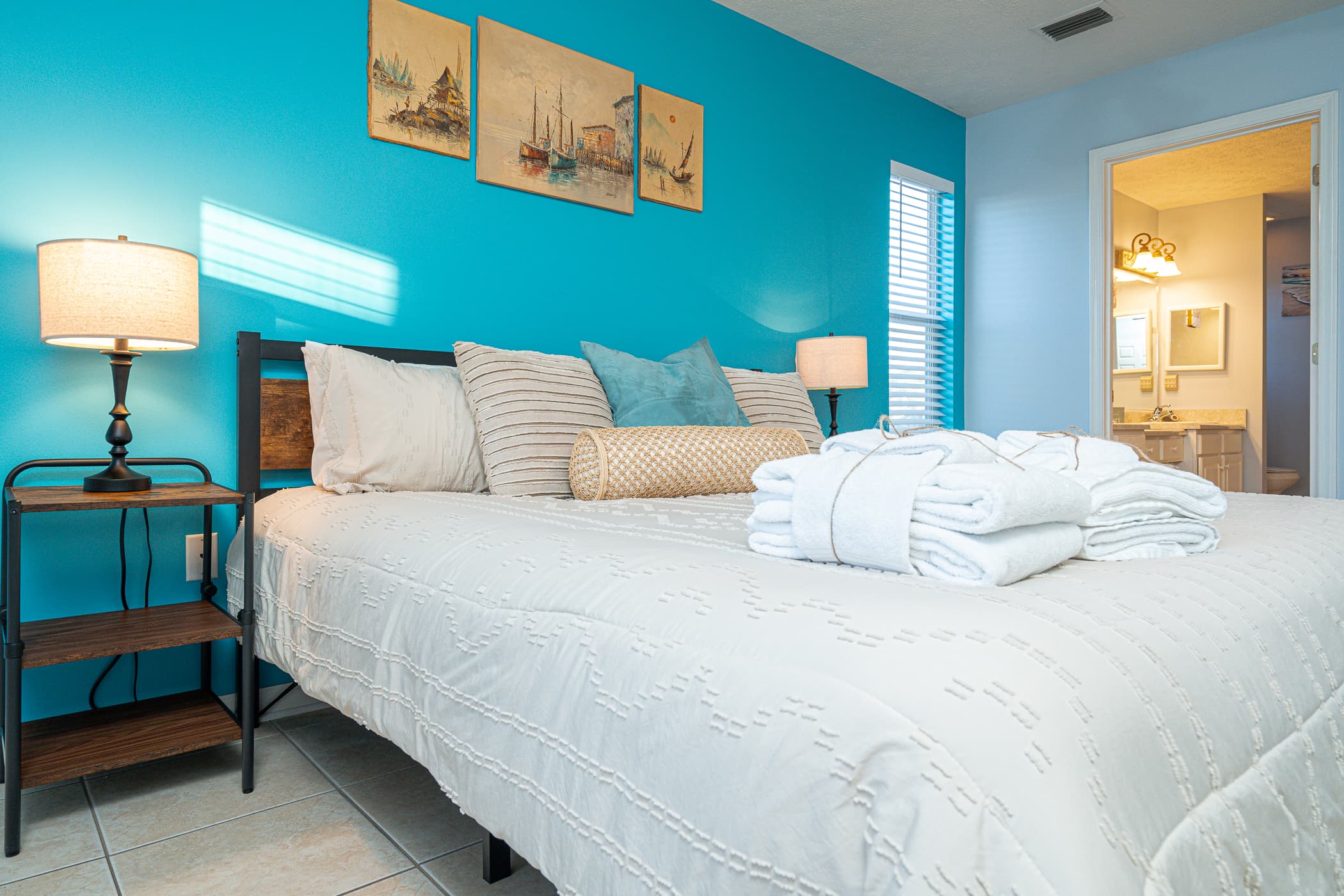 Dining Room: Gather around the rustic table for lively meals and ocean-inspired decor!