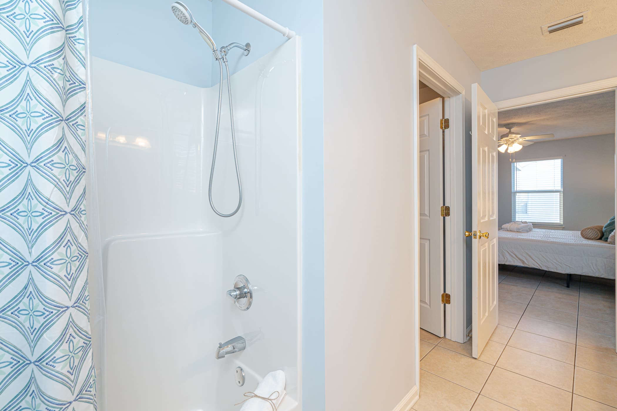 Master Bathroom: Bright and airy space with double sinks and beachy decor to refresh your day!