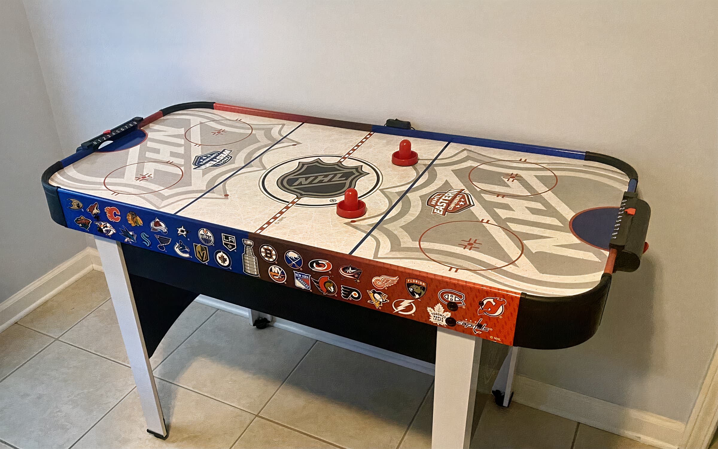 Kids' Game Room: Battle it out with friends on this thrilling air hockey table!