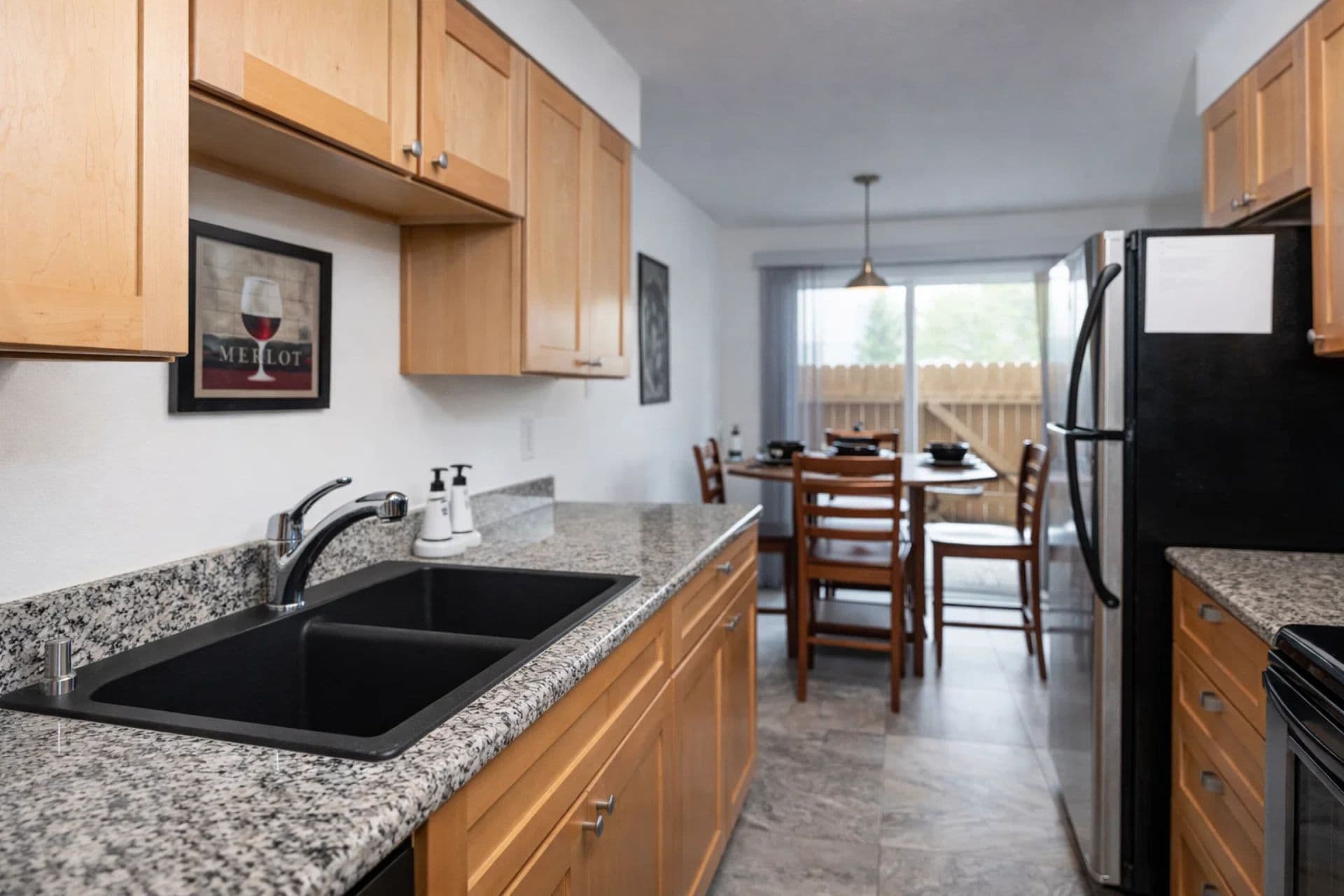 Kitchen: Enjoy a stylish space with modern appliances and a charming dining nook for meals together!