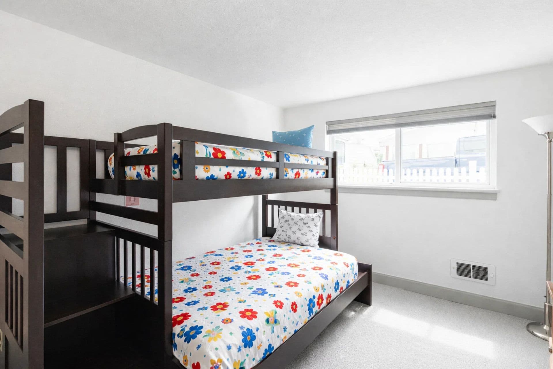 Bunk Room: Delightful floral patterns and fun bunk beds for the little adventurers!