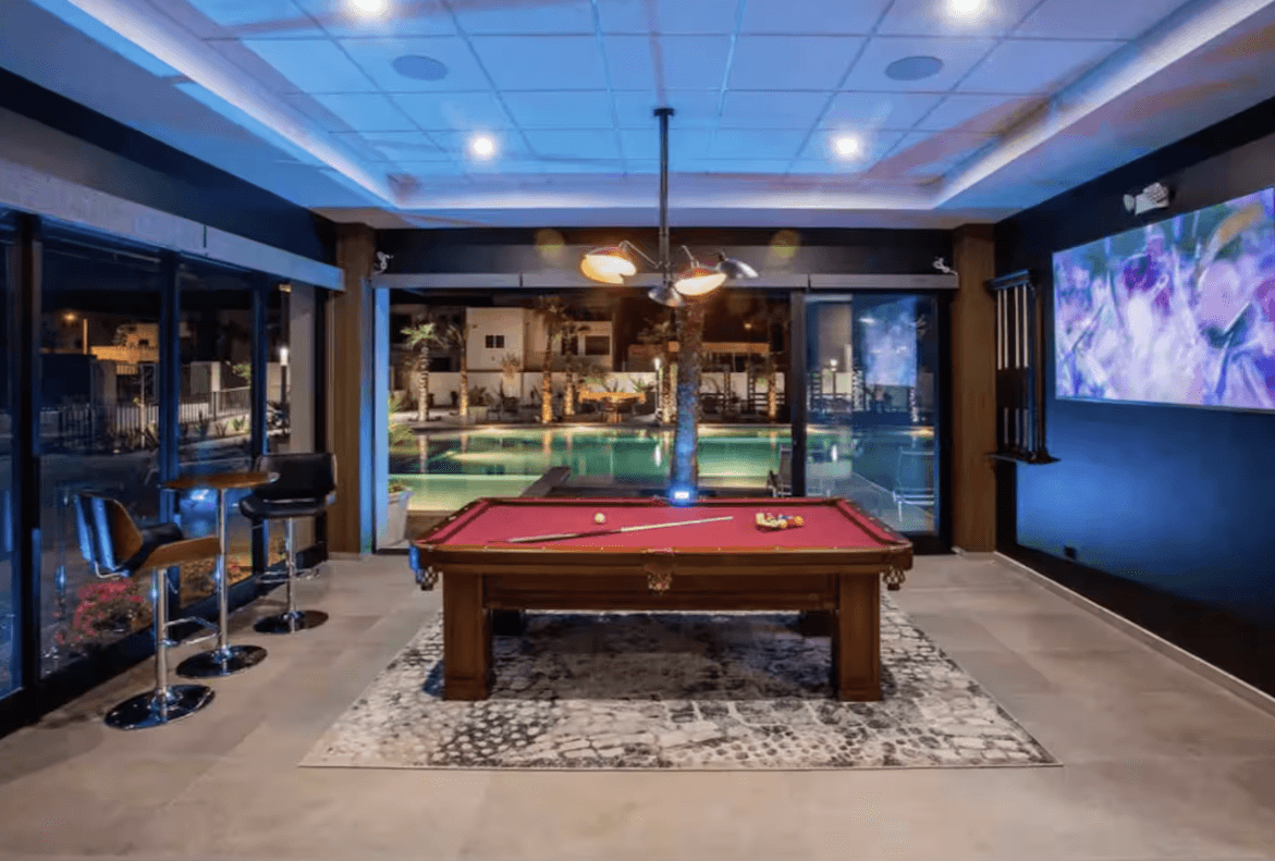 The clubhouse has many amenities including a pool table, fitness center, sauna, a restaurant and bar.