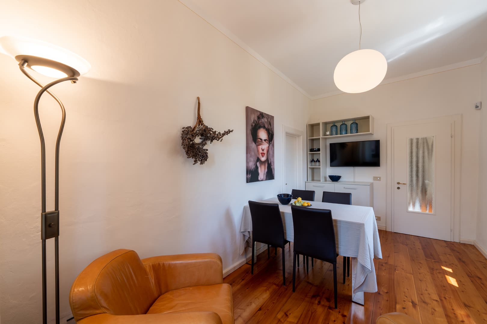 The living room and dining room of the apartment