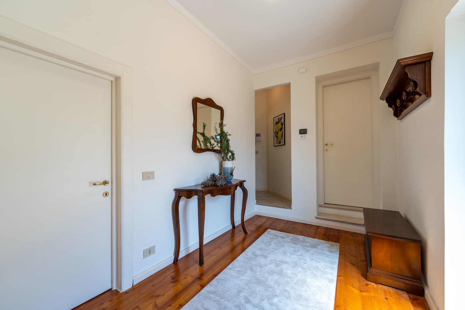 Entrance to the apartment with two bedrooms, bathroom and kitchen