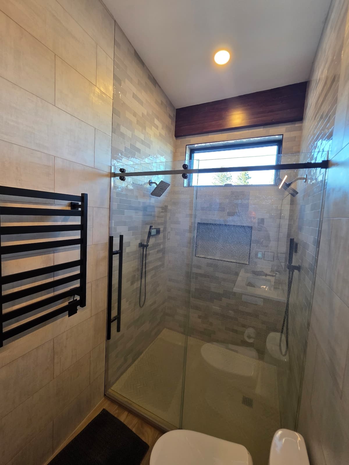 Tile shower with electric controls