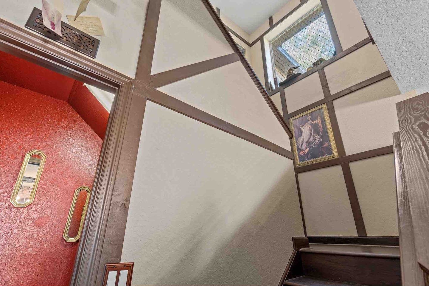 A sleeping Dumbledore awaits you while heading upstairs to the other house dormitories. 