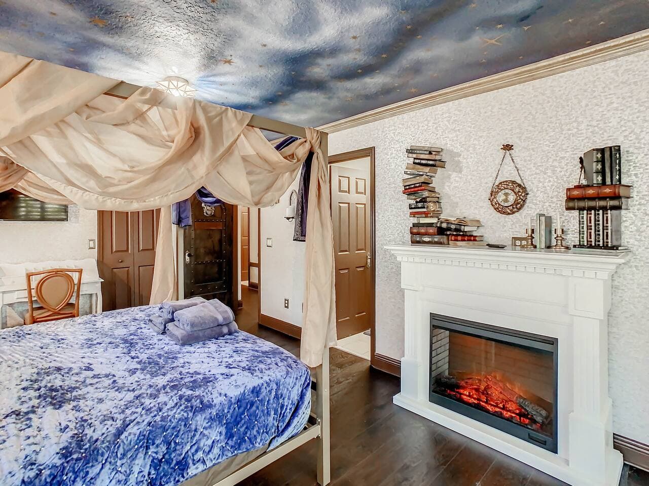 Floating books above the fireplace.