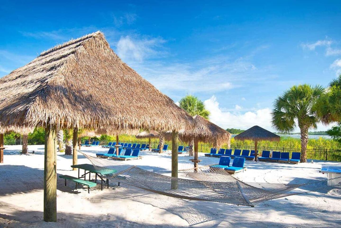 Enjoy time on the sand or in a hammock in between ping pong, billiards, fishing, and sand volleyball