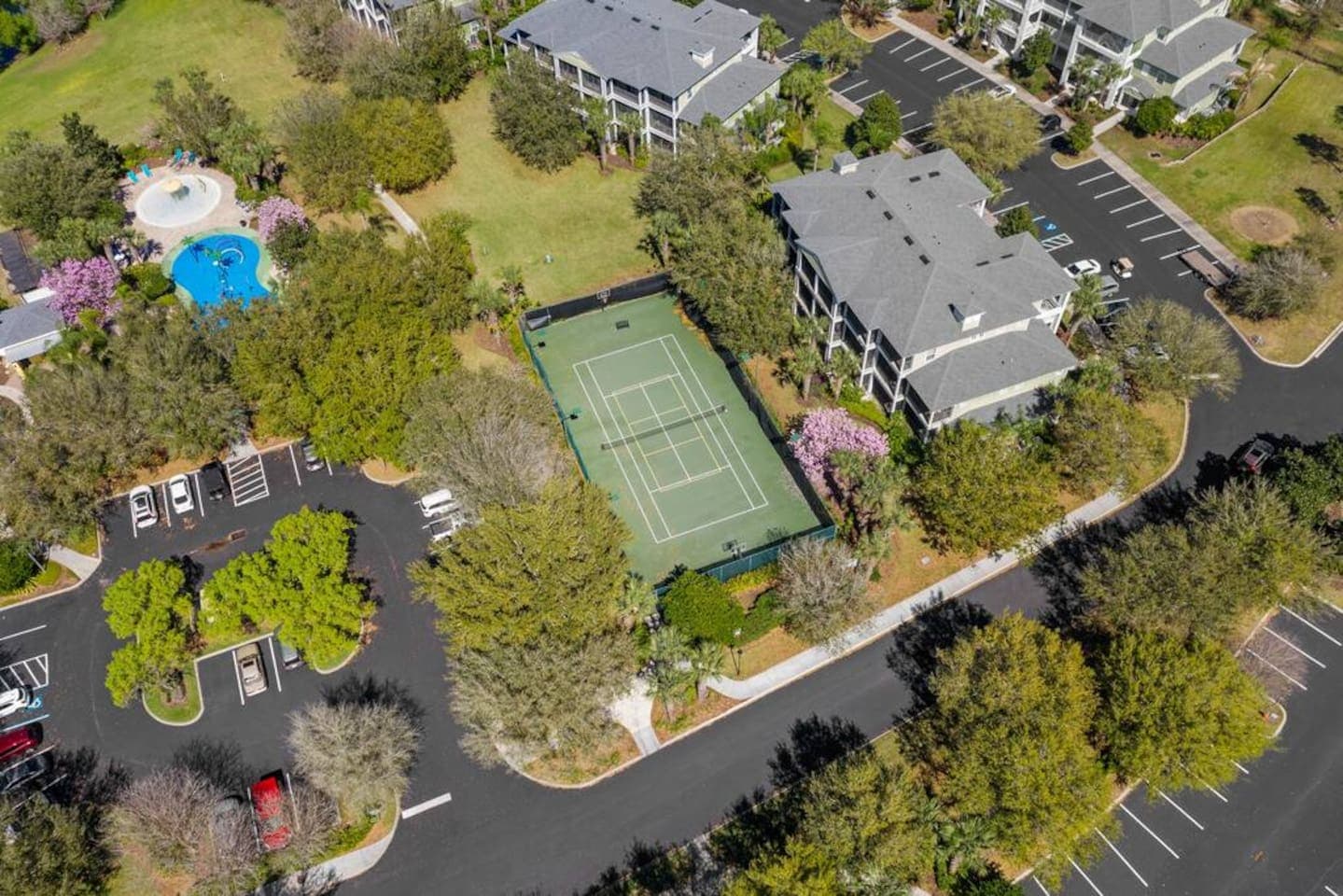 Aerial view of the tennis courts, basketball court, and pickleball court