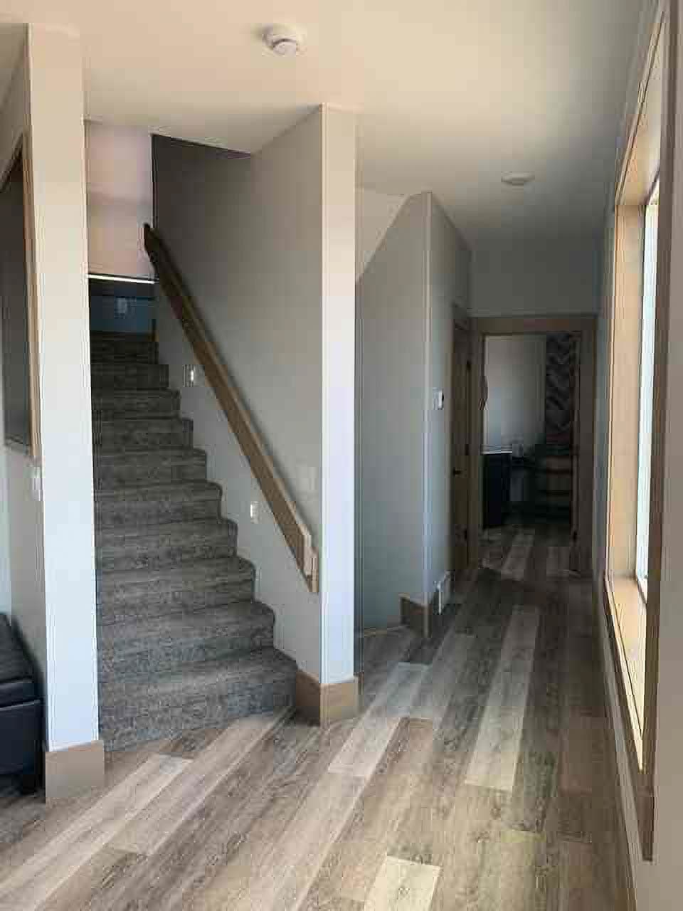 Hall and stairway from dining/kitchen.
