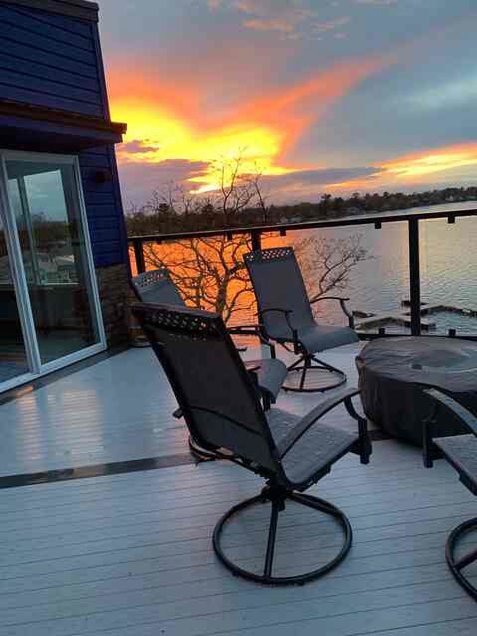 Great gathering space with a beautiful view and gas fire to enjoy in the Spring, Summer, and Fall. The chairs are put away for the winter season.