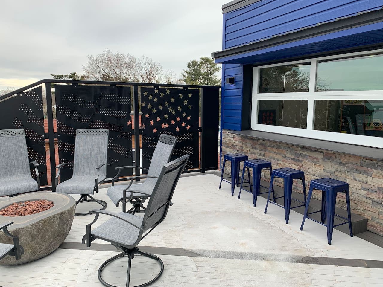 Great gathering space with a beautiful view and gas fire to enjoy in the Spring, Summer, and Fall. The chairs are put away for the winter season. 