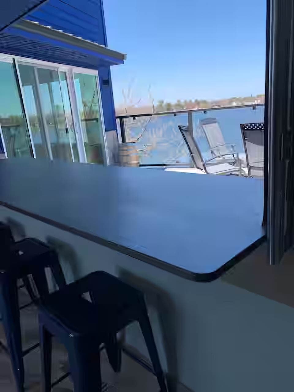 Pass-through bar top from game room to rooftop deck overlooking Lake Chetek.