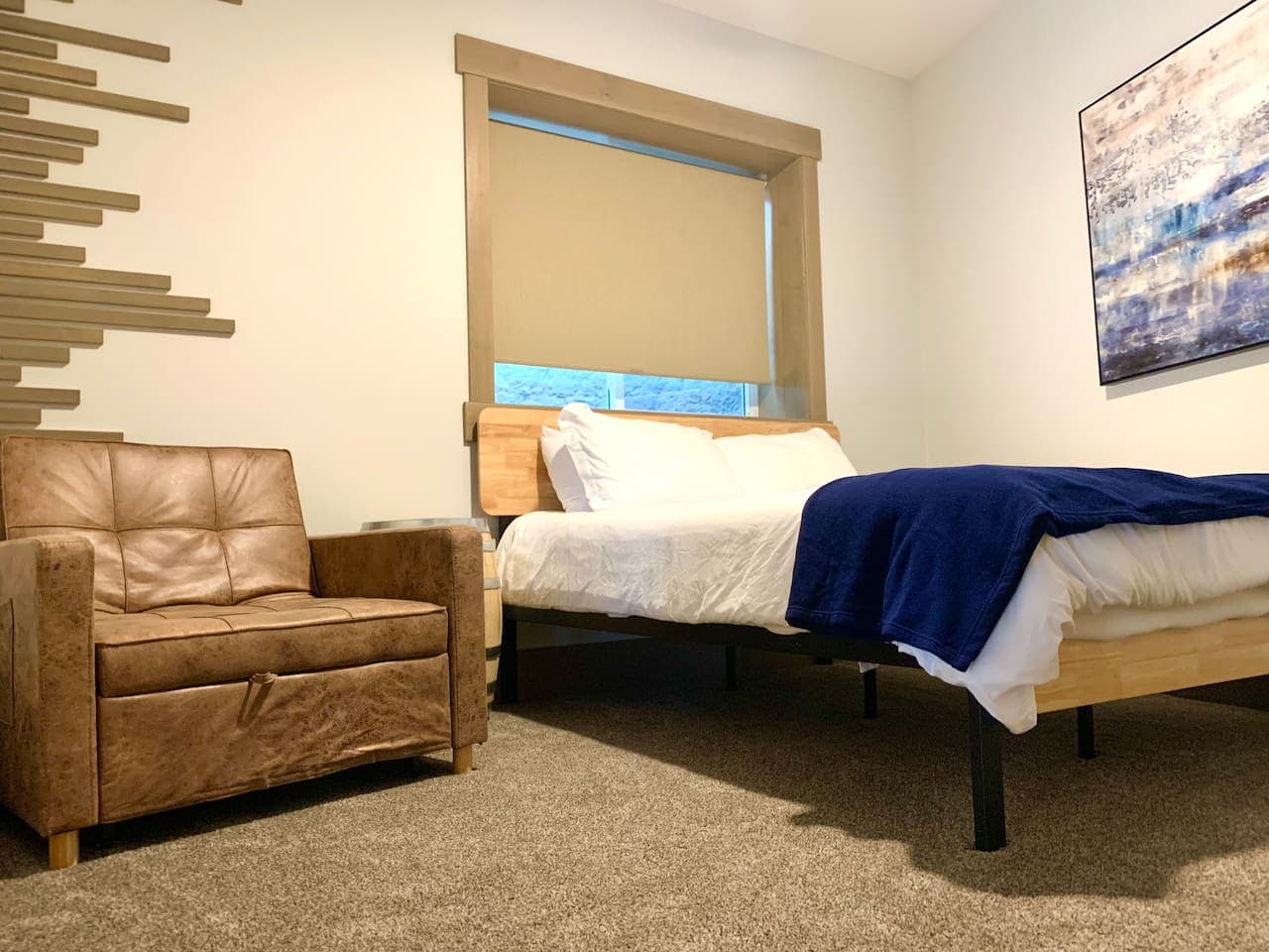 Bedroom 1 (White Room) with pullout sleeping chair.