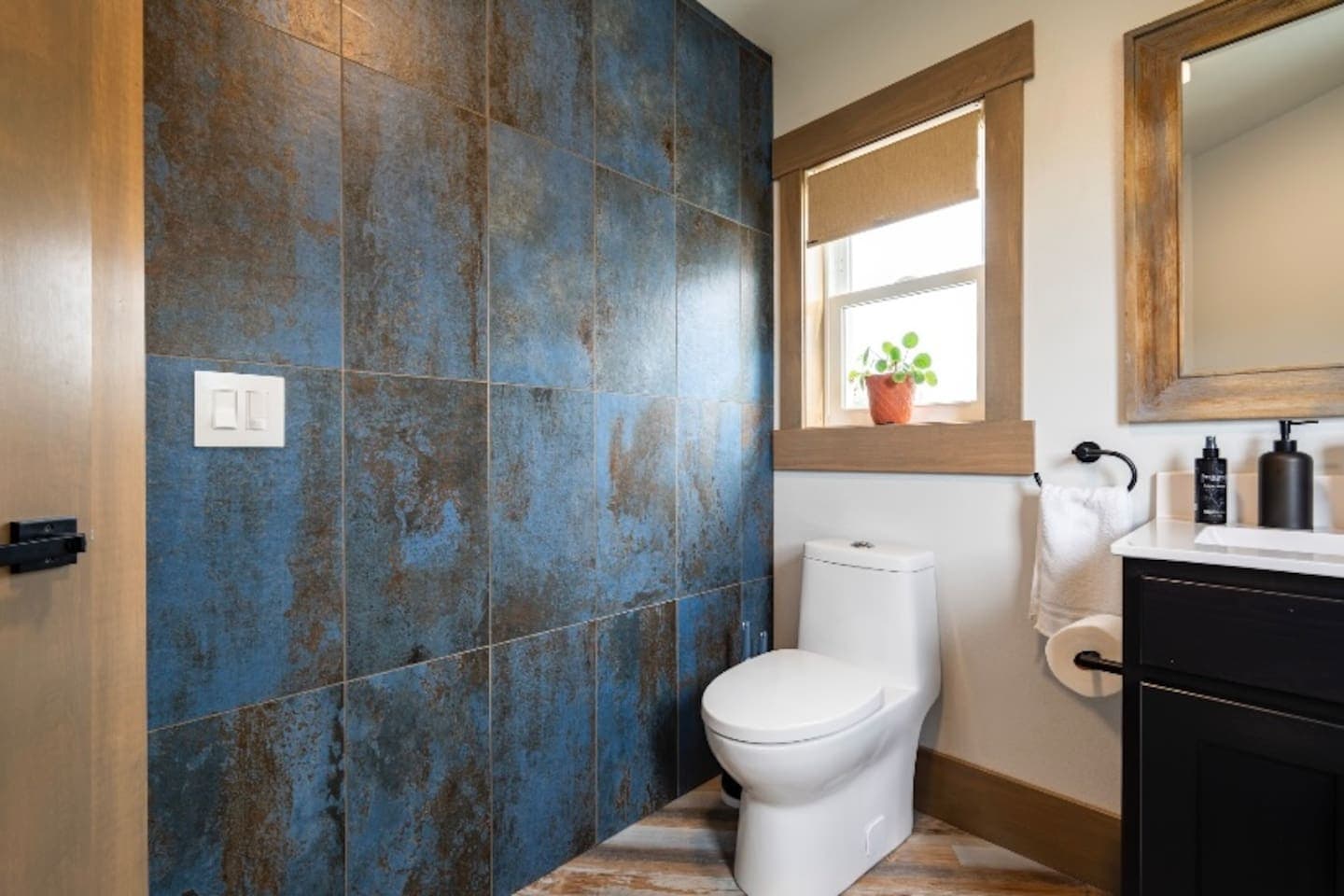 Bathroom 4 off the rooftop game room space.