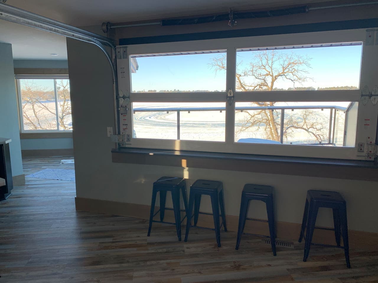 Watch the ice races from indoors with a rooftop view.