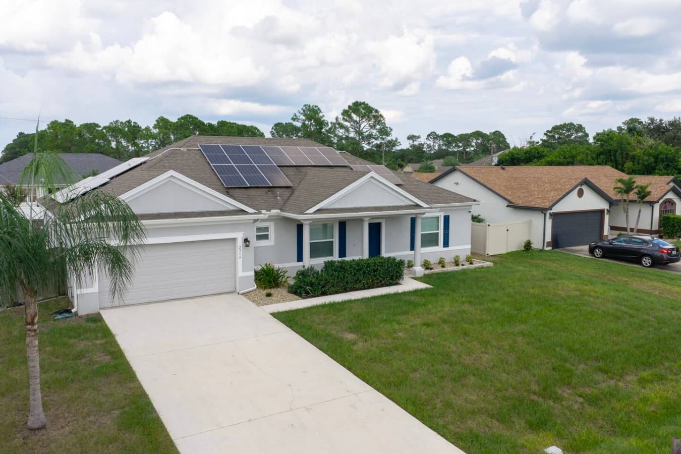 Your Space Coast getaway begins at this welcoming four-bedroom home in peaceful Palm Bay.