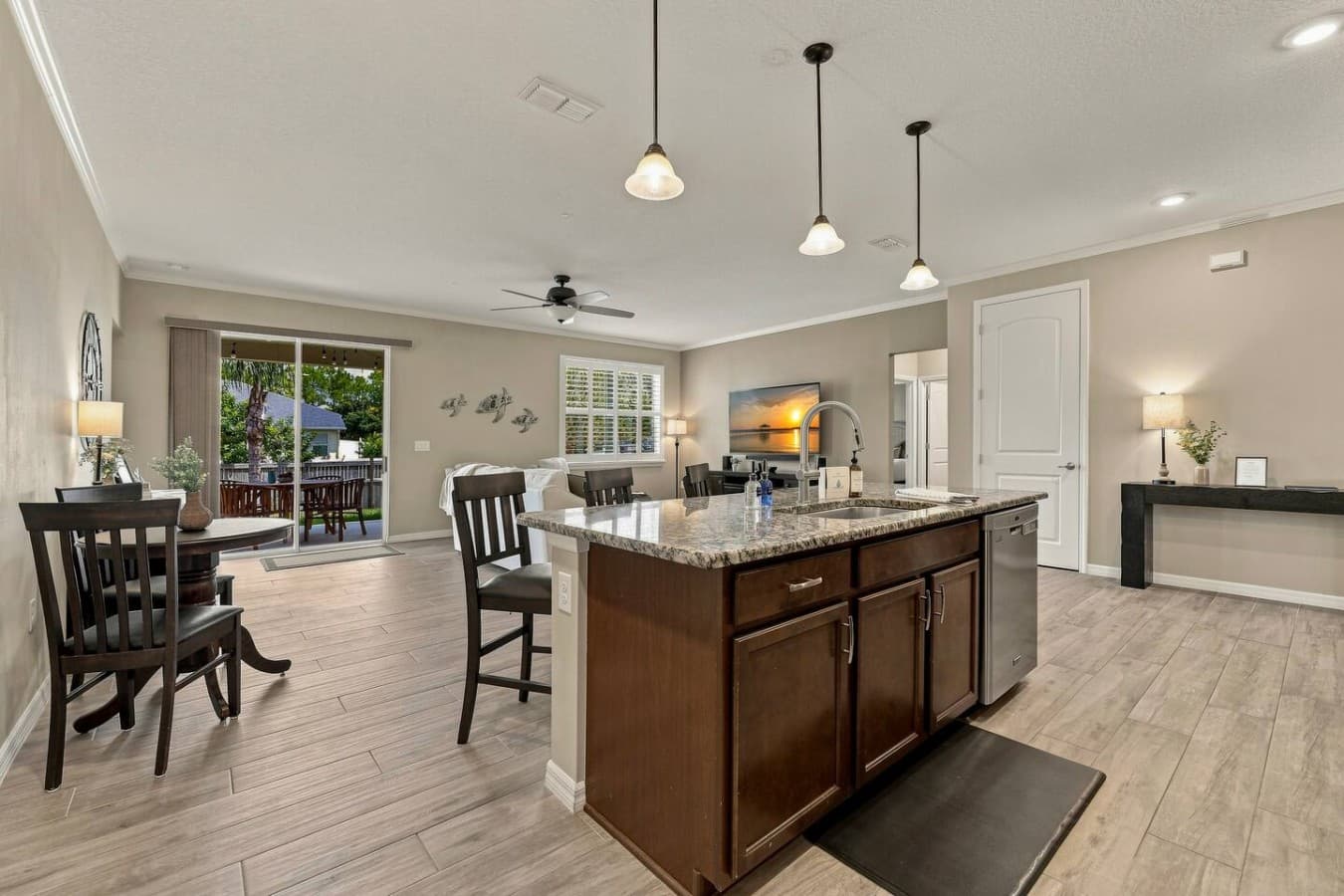Spacious kitchen with granite countertops and stainless steel appliances
