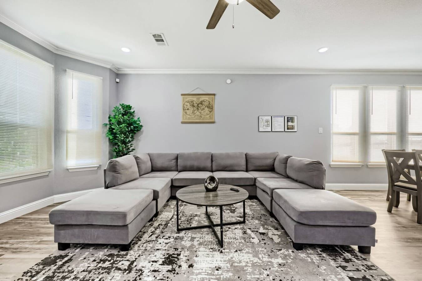 Large windows bring in plenty of natural light throughout the main living space.