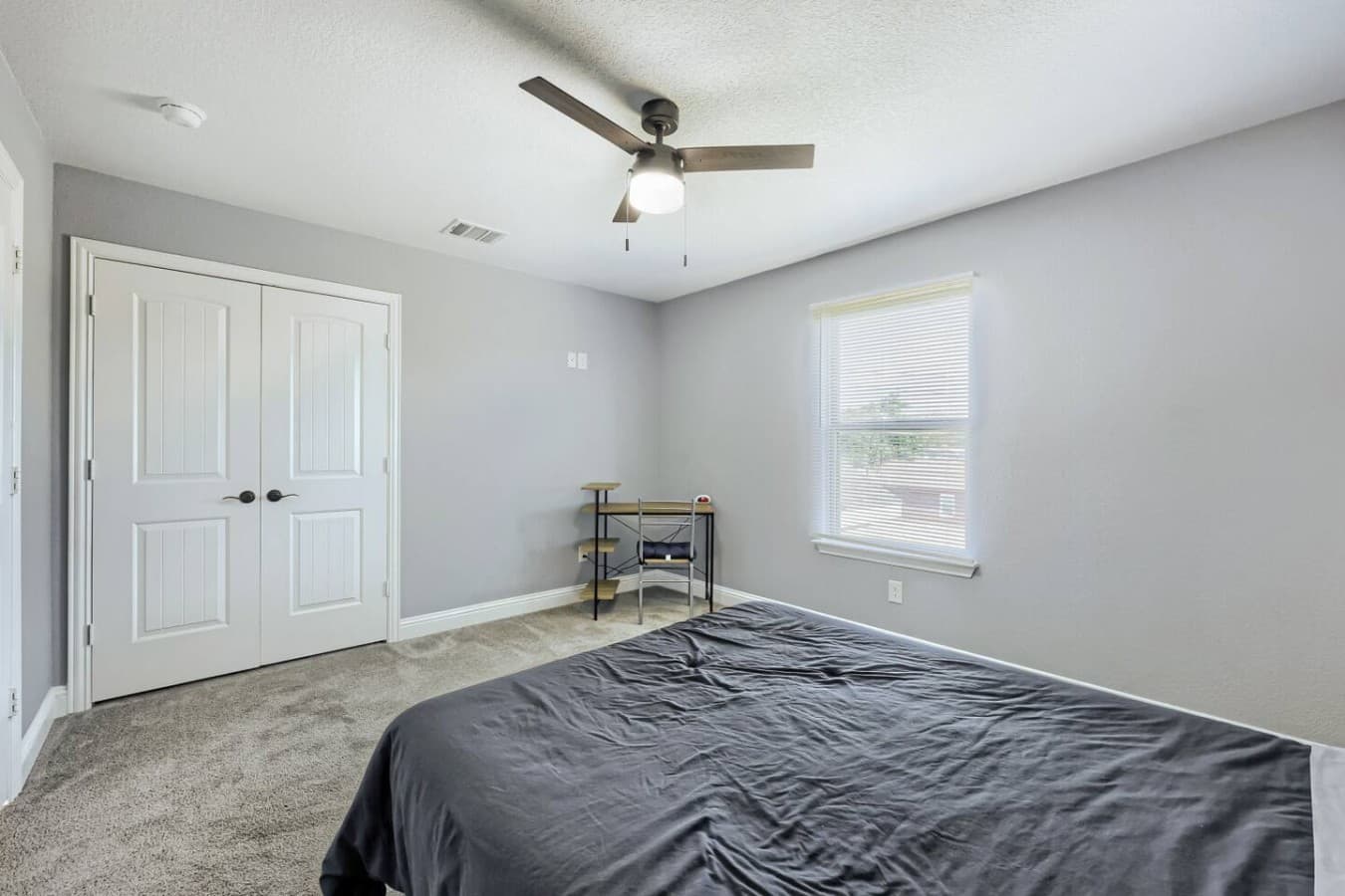 Relax in a comfortable queen bed and enjoy a dedicated workstation in the room.