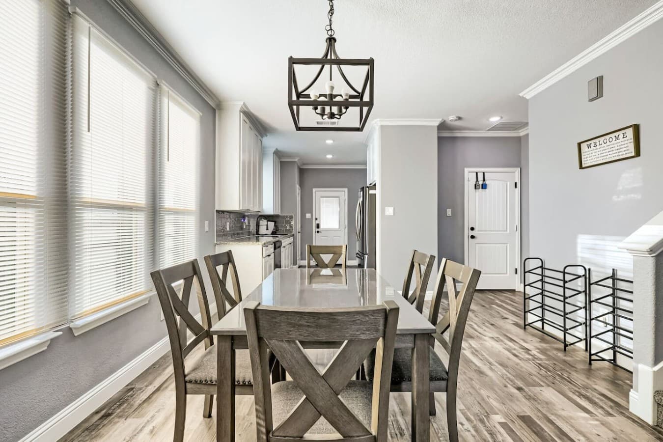 Gather around the dining table for six, with the kitchen conveniently steps away.