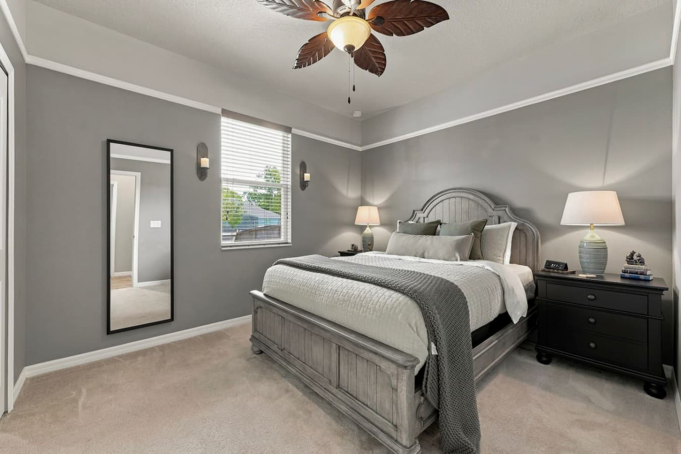 Settle into the inviting queen-size bed in this peaceful guest bedroom.