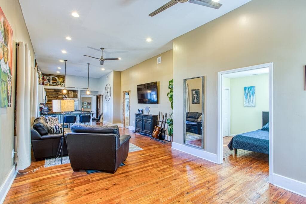 Open Floor Plan, 75 inch TV,  12 Foot Ceilings 75 Inch TV Modern Amenities Hardwood Floors