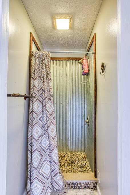 Standup shower upstairs. 