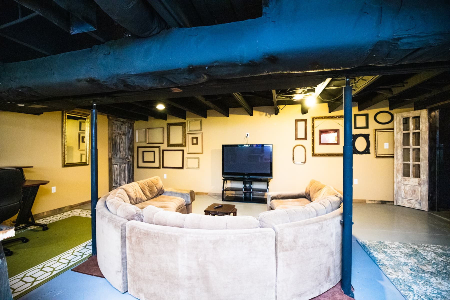 Basement, 54 inch TV, circular couch