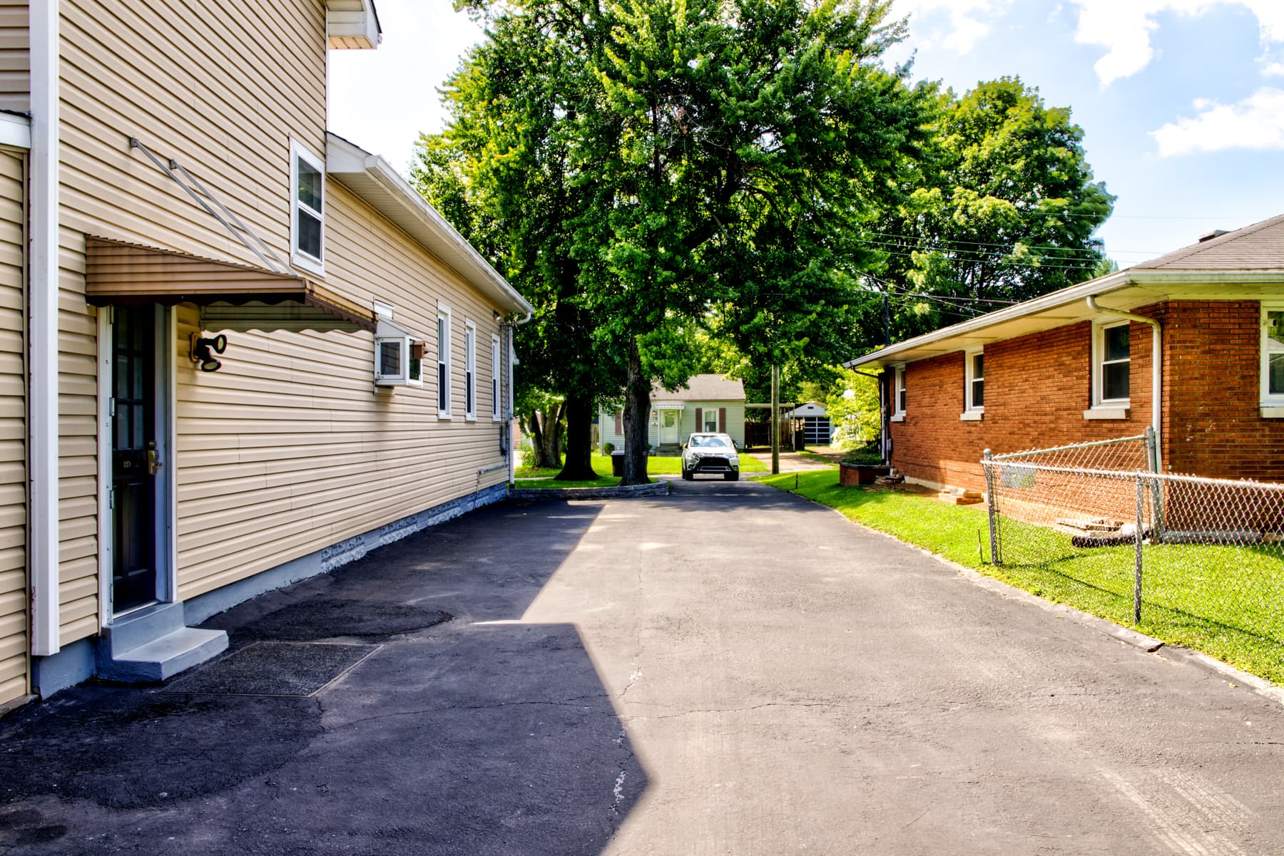 Large, double wide driveway with enough room for 6 to 8 cars or an RV or trailer