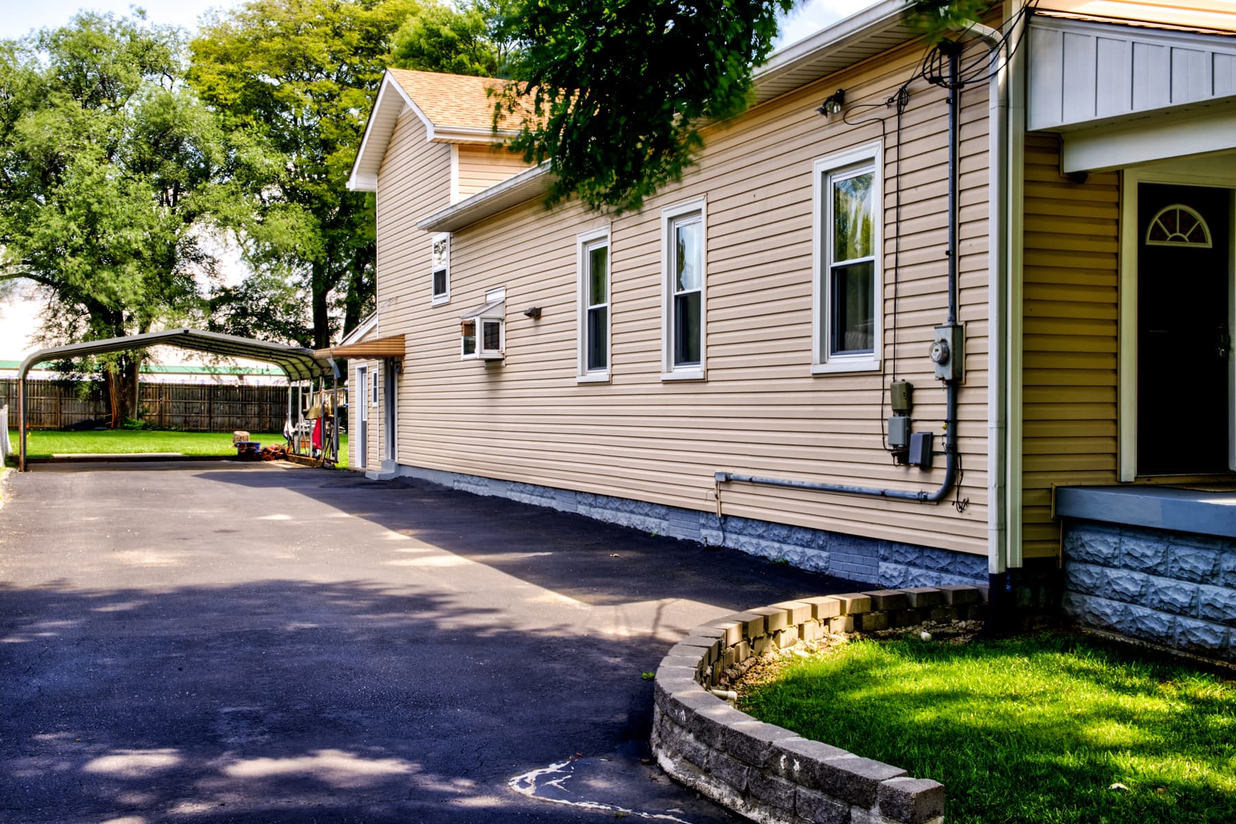 Large, double wide driveway with enough room for 6 to 8 cars or an RV or trailer