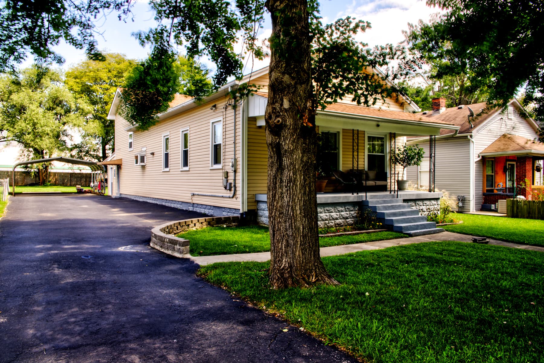Large, double wide driveway with enough room for 6 to 8 cars or an RV or trailer