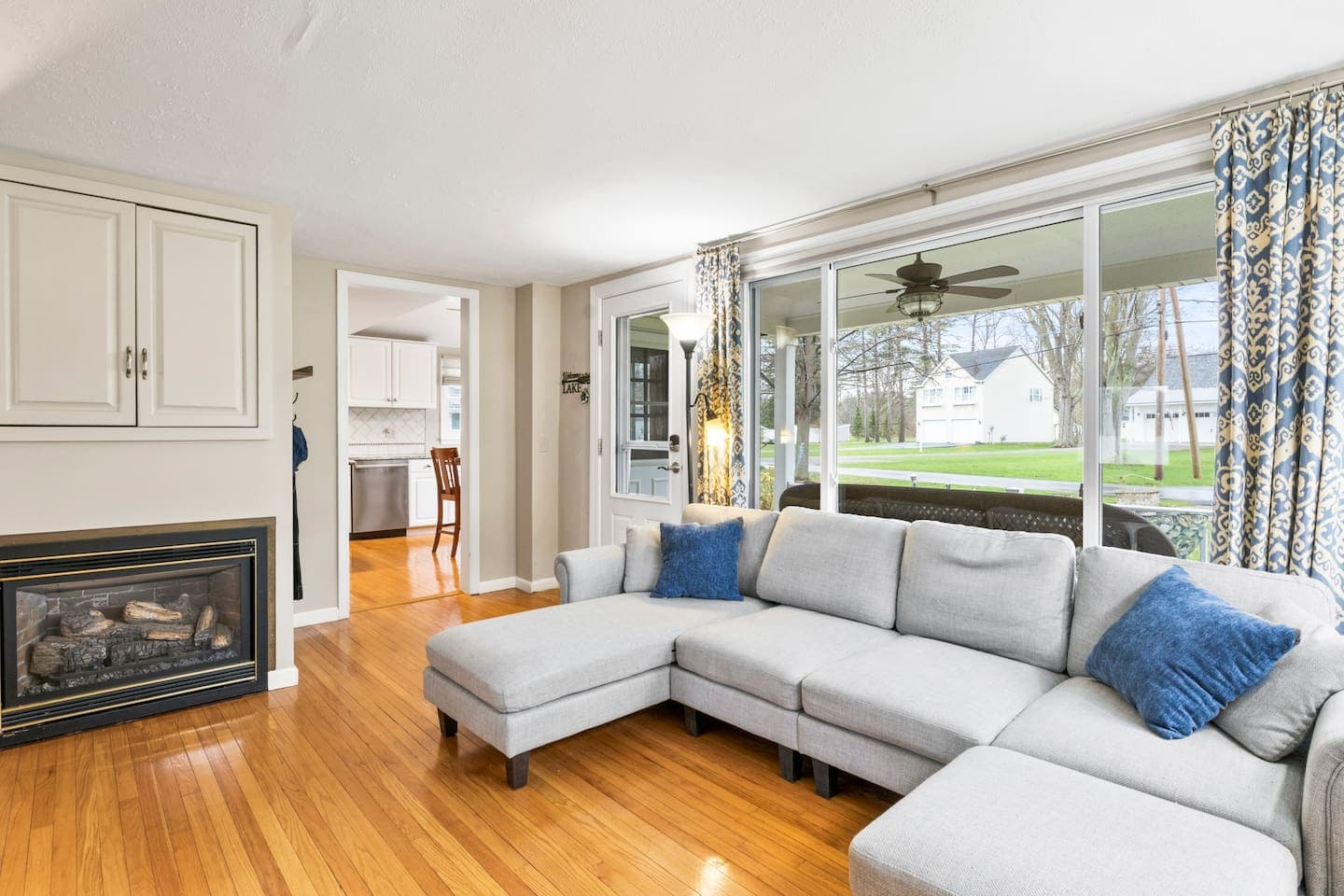 Living room with fireplace and outdoor views