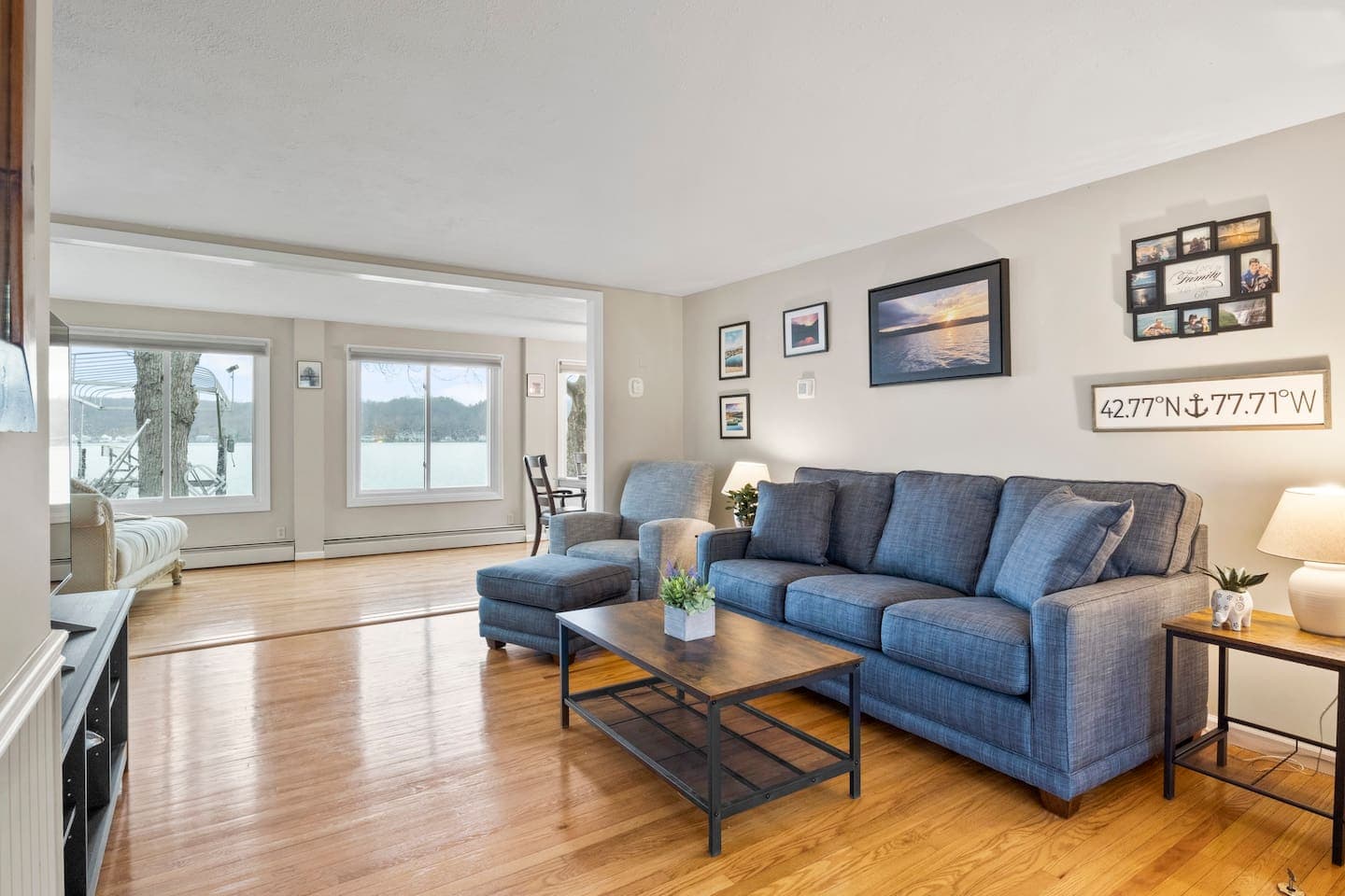 Lake-facing lounge with blue sectional sofa