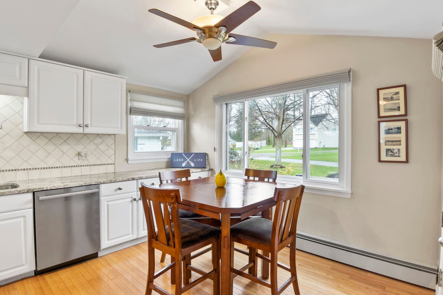 Breakfast table beside lake-facing windows