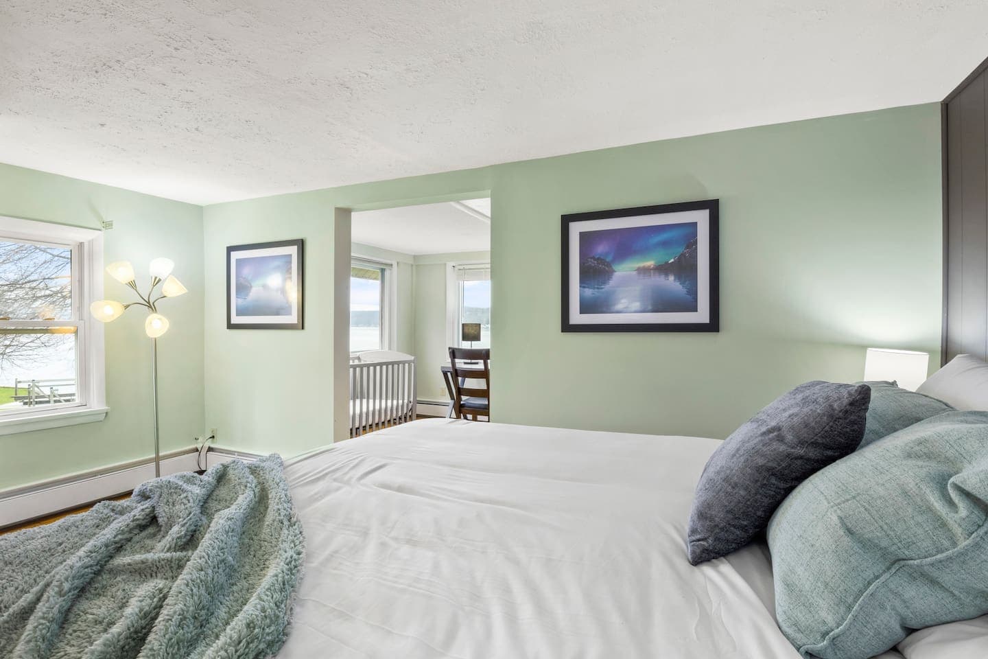 Soft green bedroom with adjoining small room 