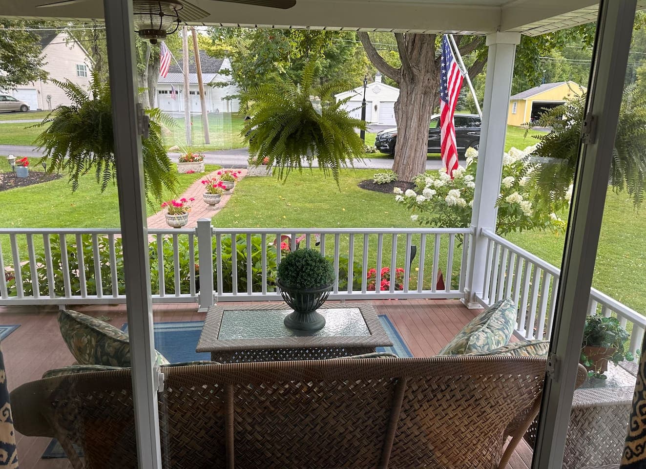 Furnished porch overlooking the lawn