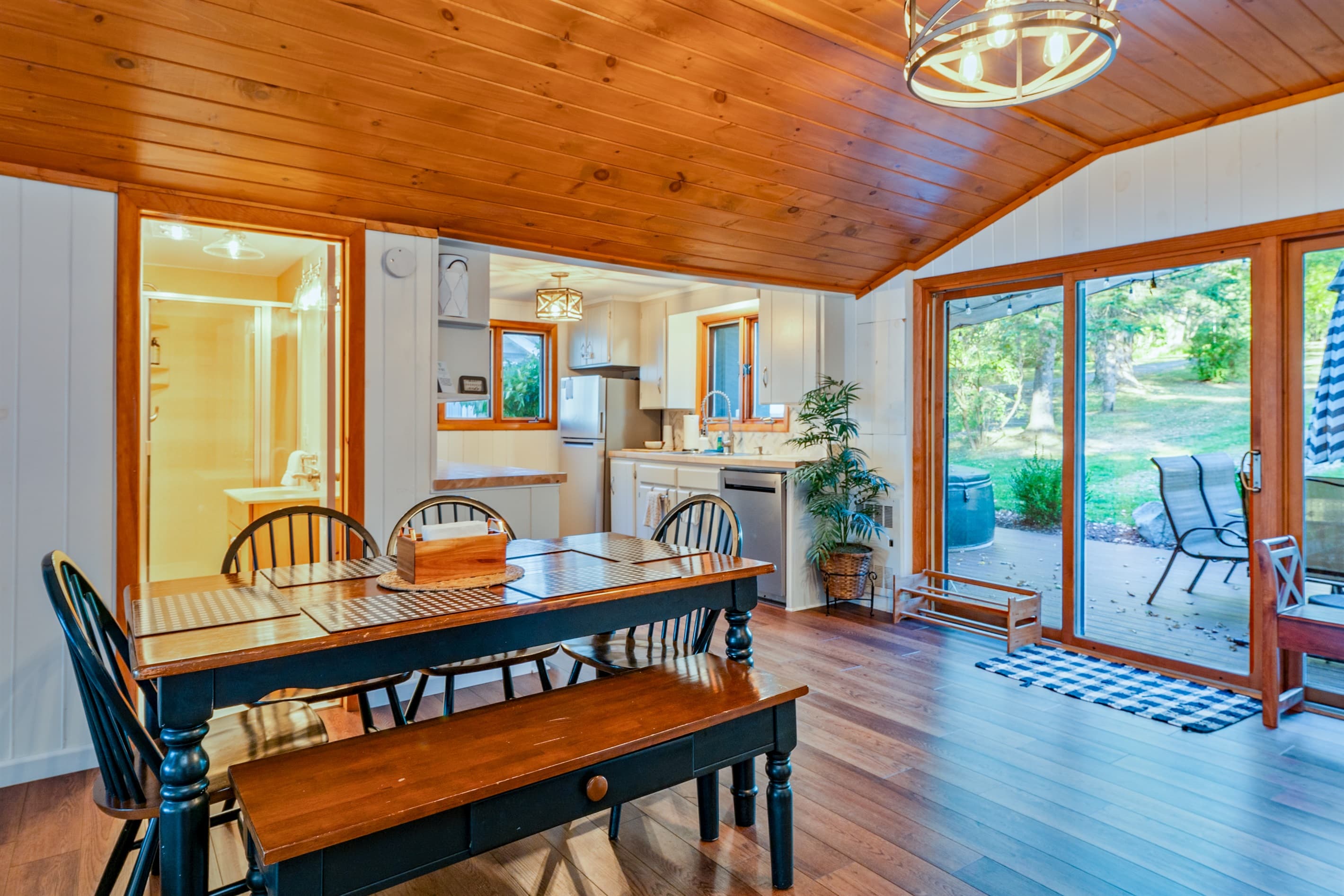 Entry area with glass doors and wooden framing 