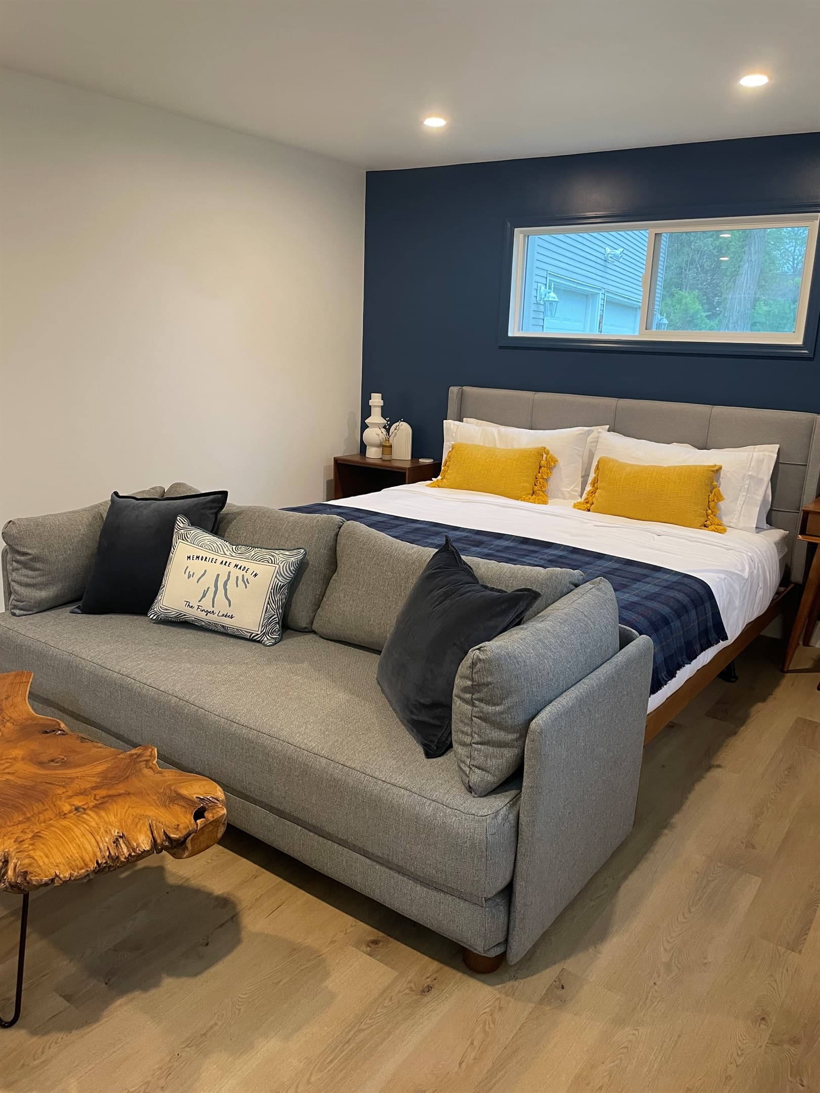 Bedroom with gray and yellow bedding
