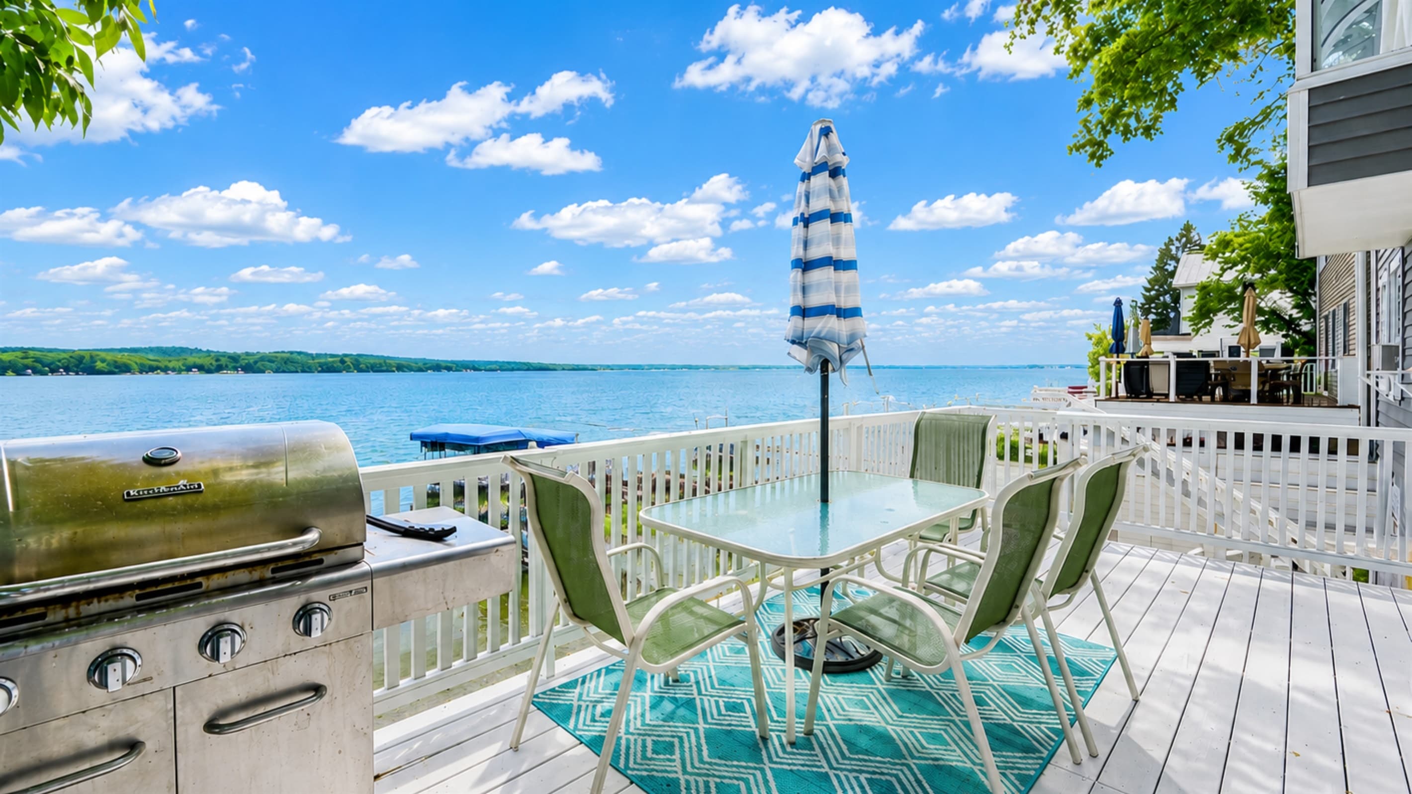 Outdoor dining and grill with lakeview