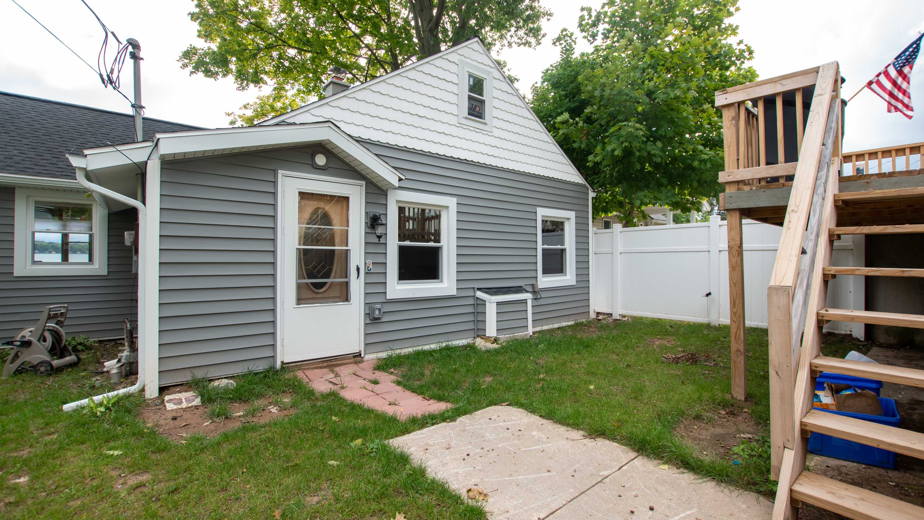 Rear exterior with backyard access