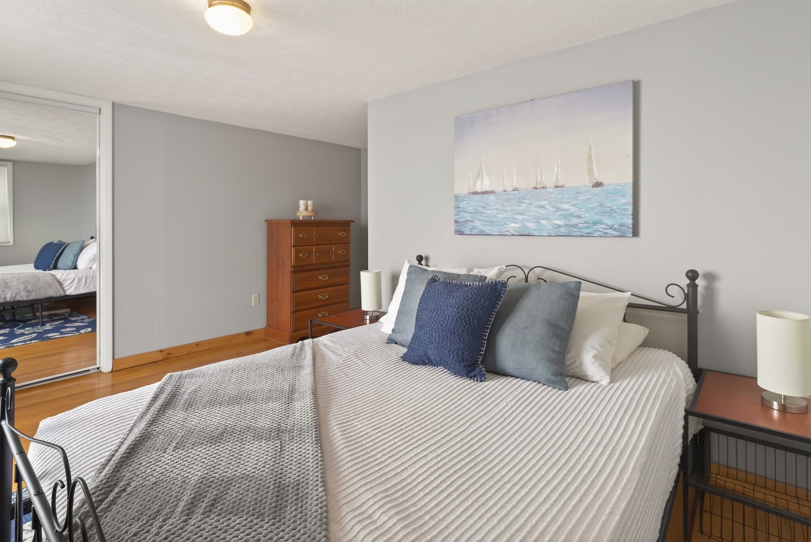 Bedroom with metal bed and nightstands