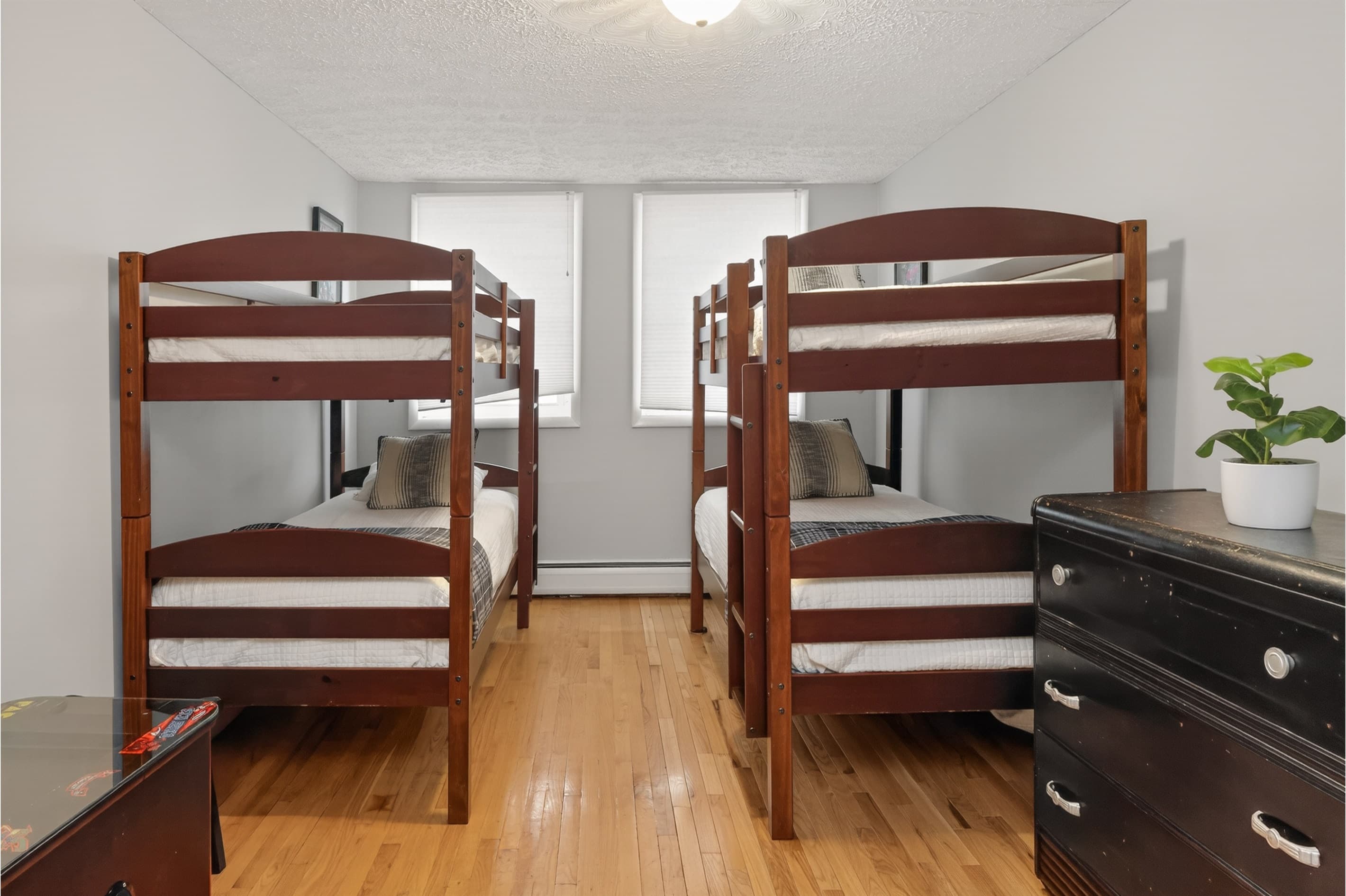 Bedroom with two wooden bunk beds