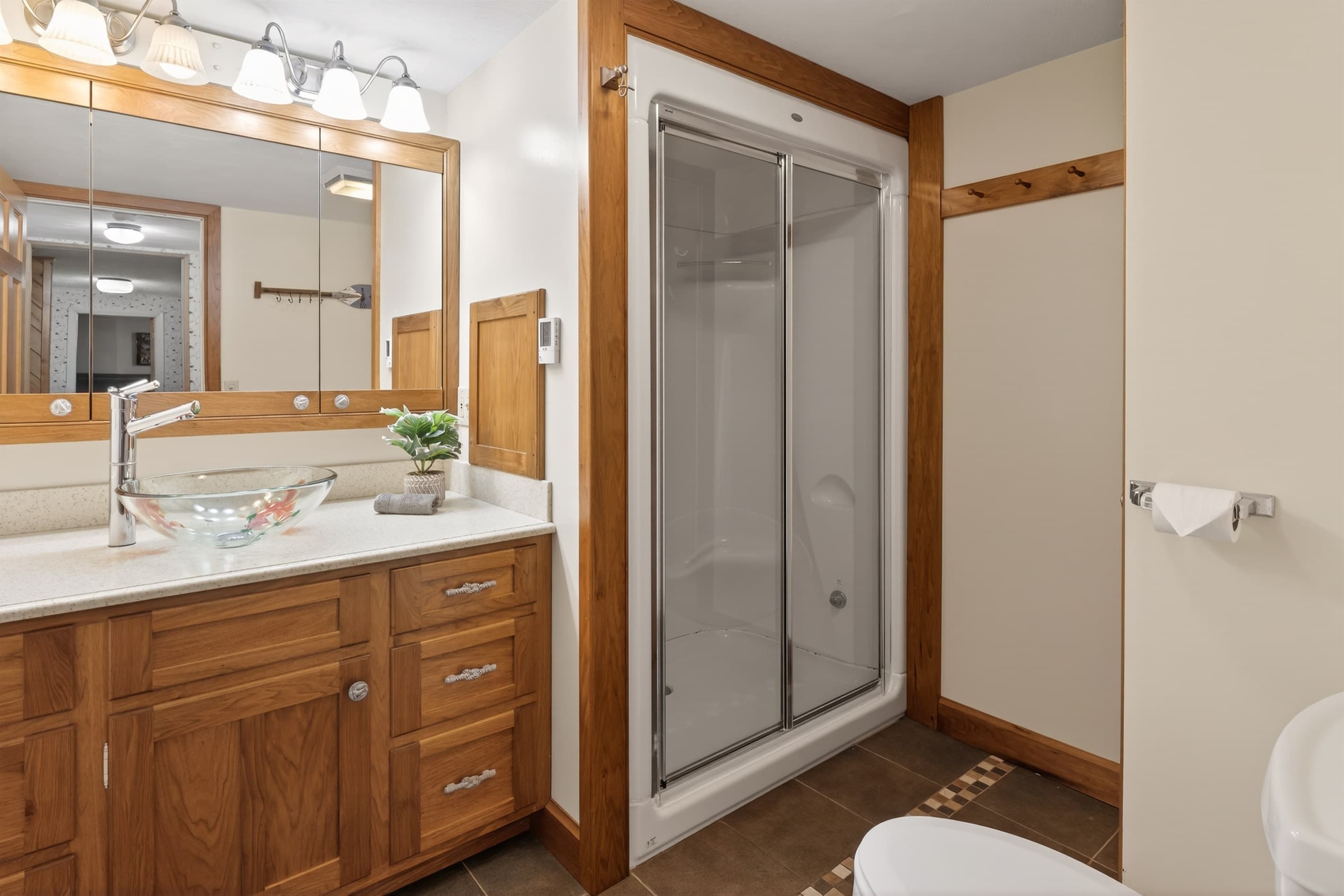 Bathroom with glass-enclosed shower