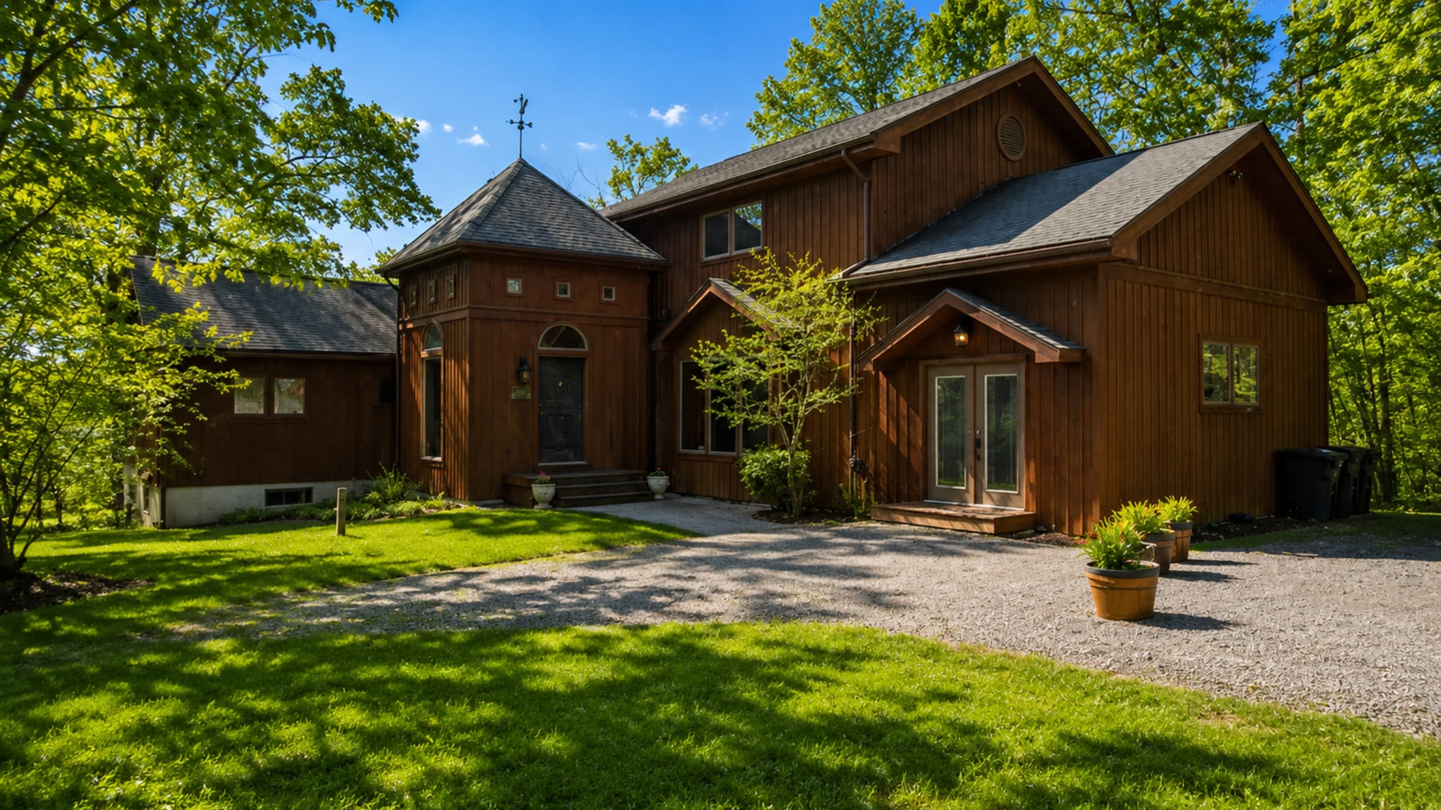 Rustic cabin exterior with covered entry