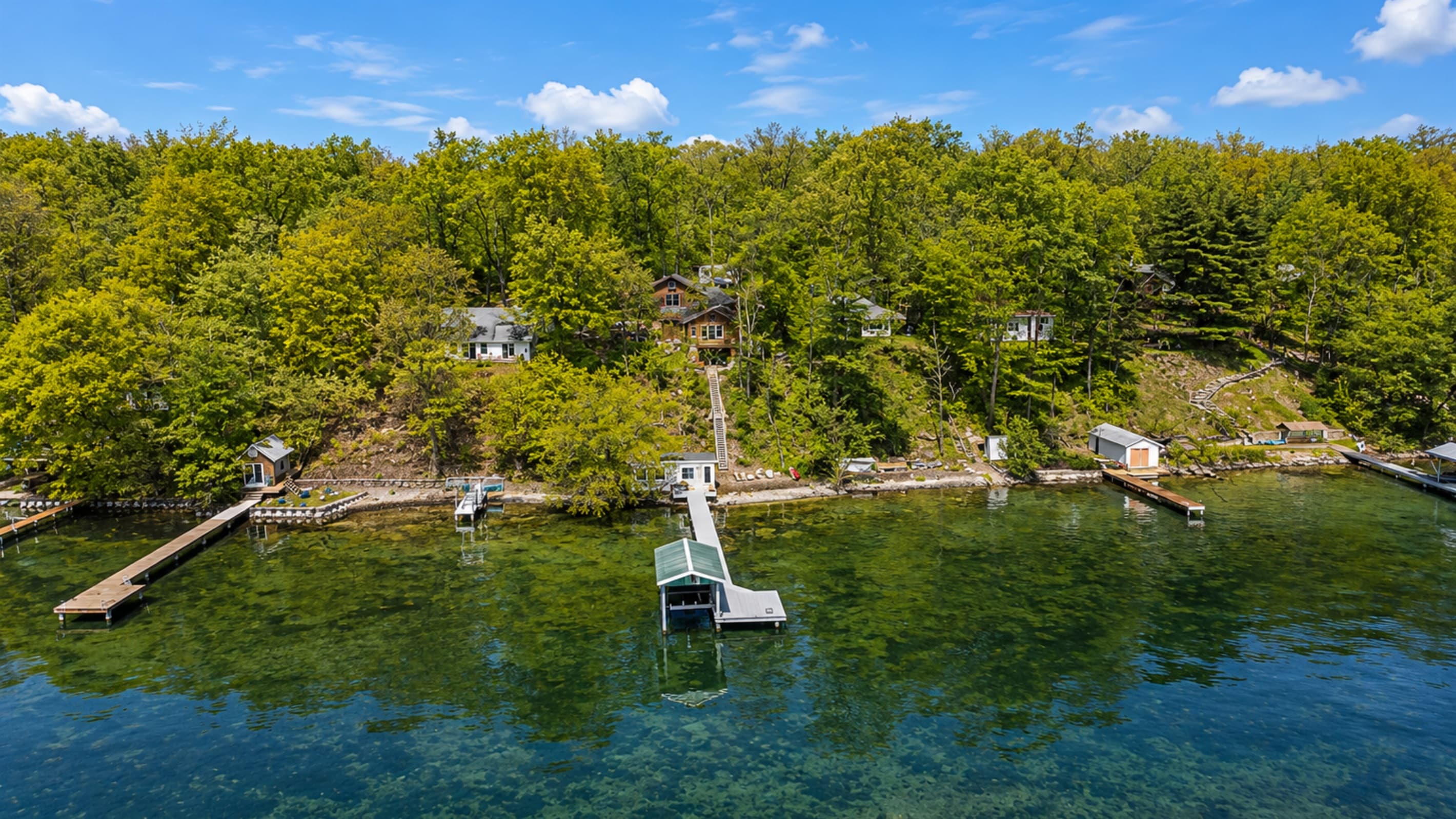 Aerial view of the home and shoreline